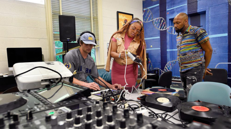 Professor Maya Shipman (Suzi Analogue) and another instructor work with a student in the Beat Lab at the Carolina Hip Hop Institute summer 2024.